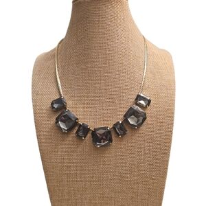 Elegant Smoky Grey Accrylic On A Flat Gold Necklace